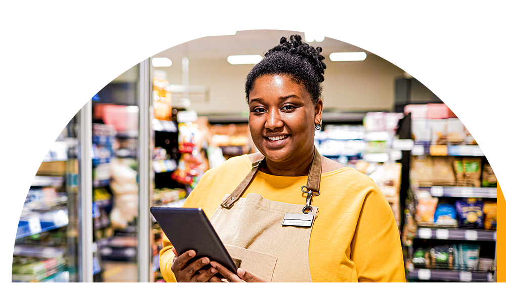 Shop owner with a tablet